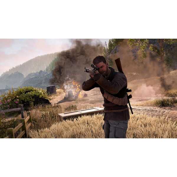 An armed soldier aims his rifle during a battle with explosions and smoke in the background.