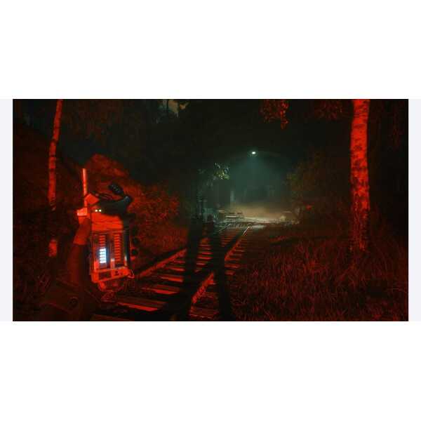 Nighttime forest scene with railway tracks and mysterious red-lit device.