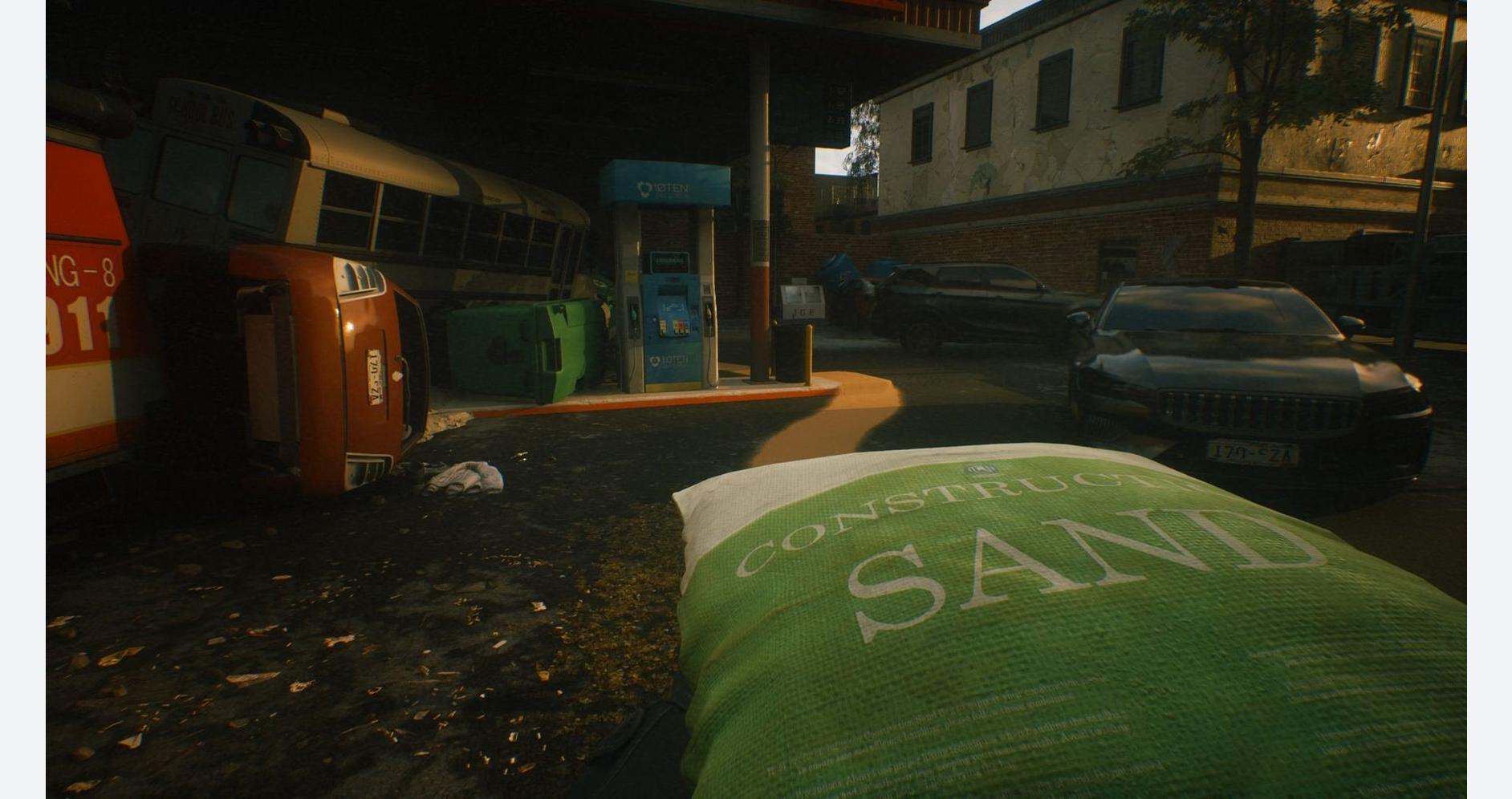 Urban scene with construction materials and parked cars in a quiet street.