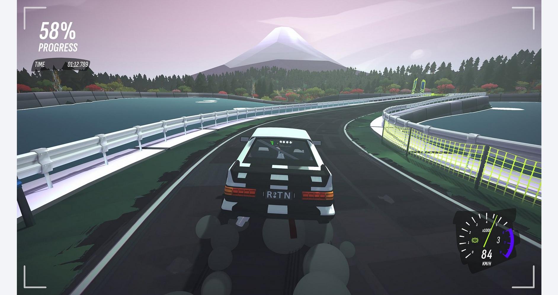 Rally car on a winding track with mountain backdrop, ideal for racing game enthusiasts.