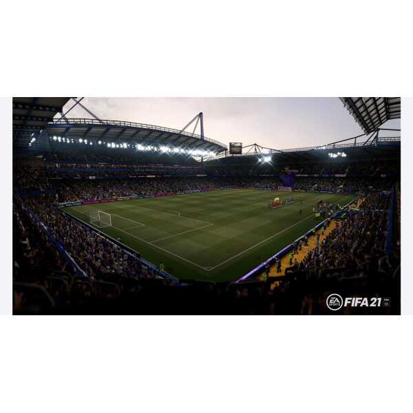 FIFA 21 stadium with vibrant crowd and illuminated pitch for gaming and sports enthusiasts.