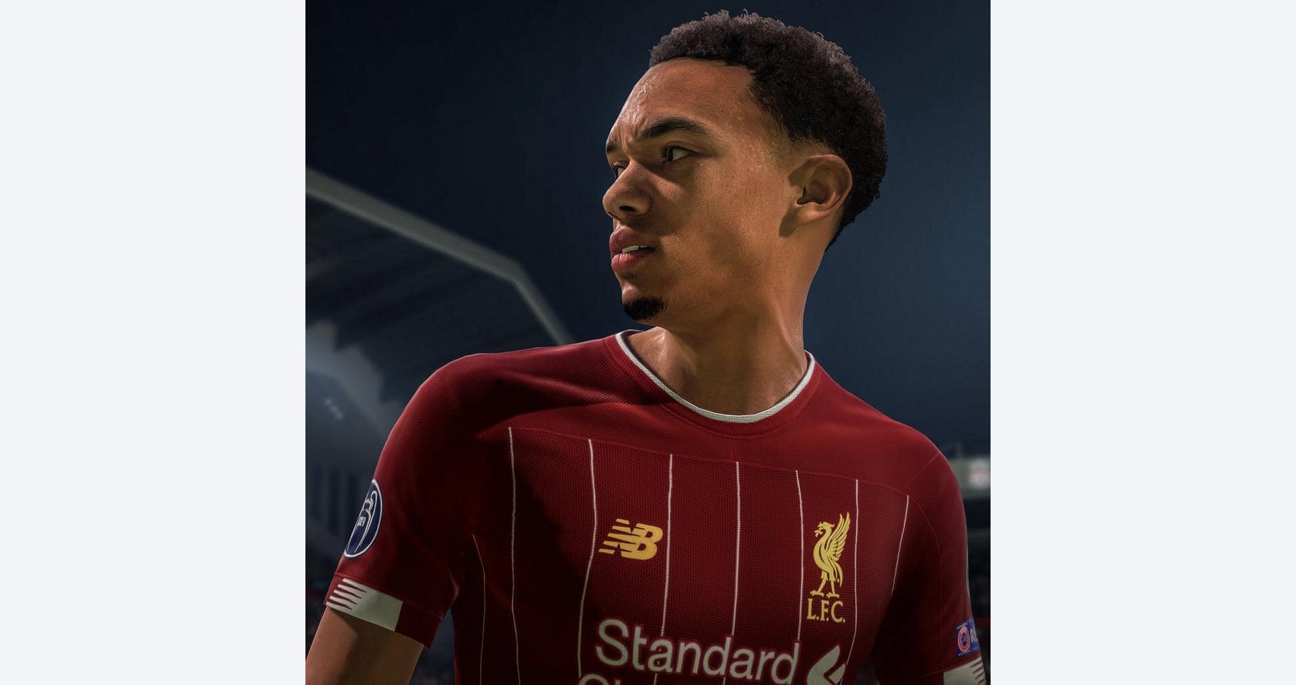 Liverpool football jersey worn by a player, showcasing team logo and sponsor.