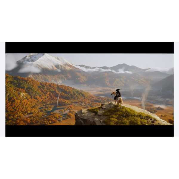 Scenic view of Yotei Mountain with autumn foliage and a hiker in the foreground.