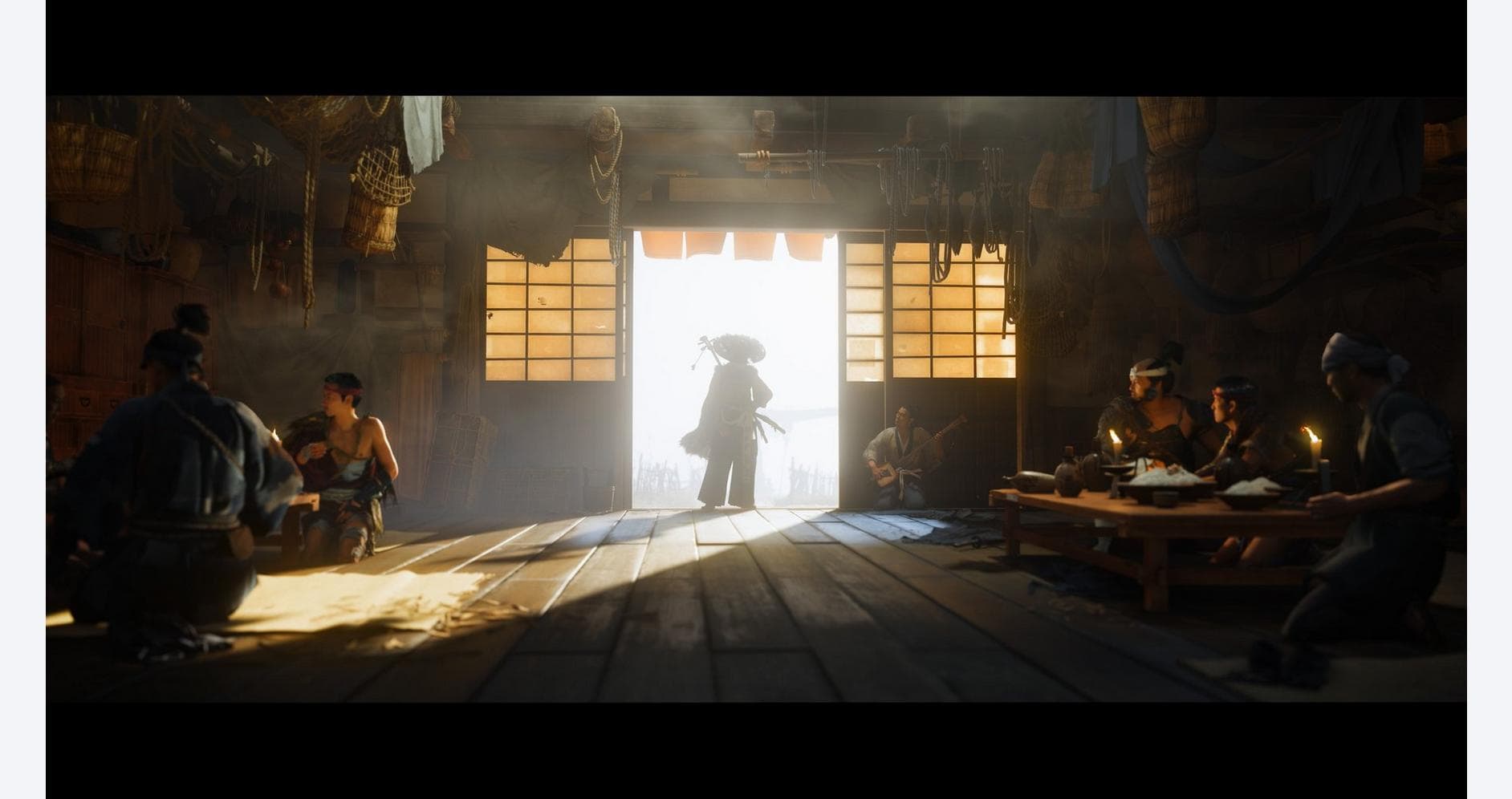 Ghost of Yotei standing in doorway with backlit glow, surrounded by samurai and villagers in a histo.