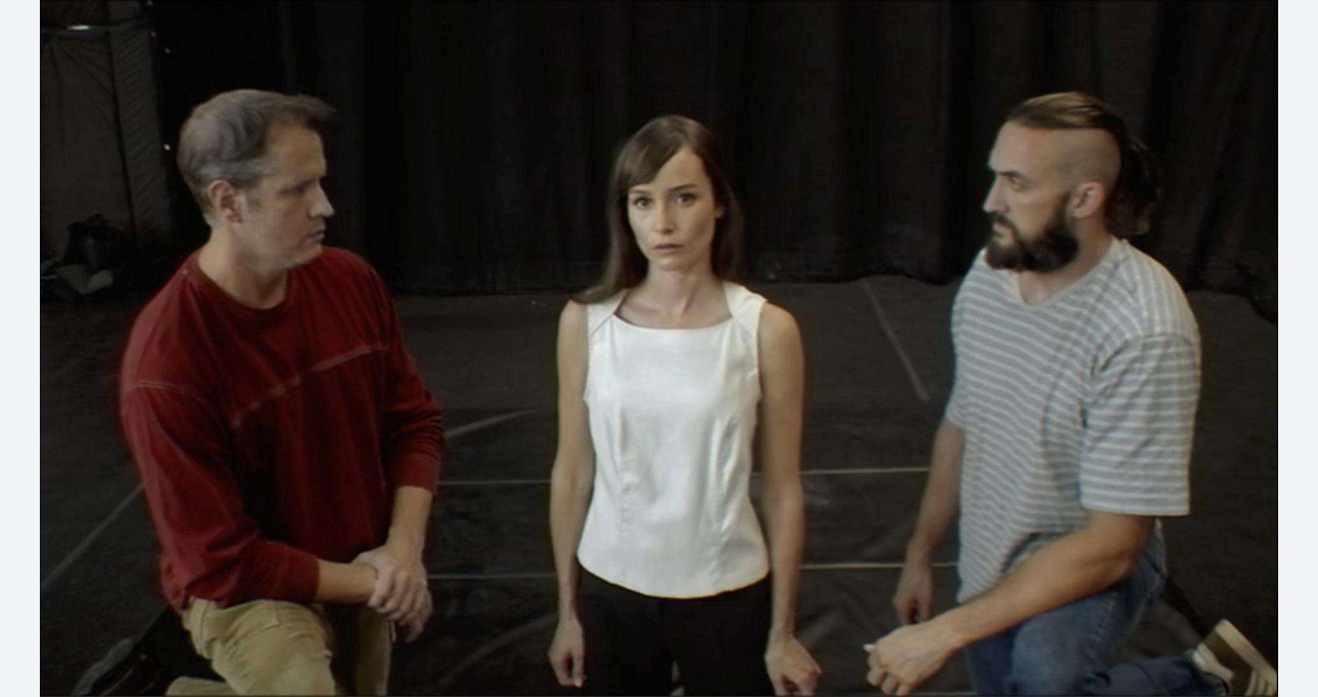 Actors performing in a theatrical scene related to IMMORTALITY.