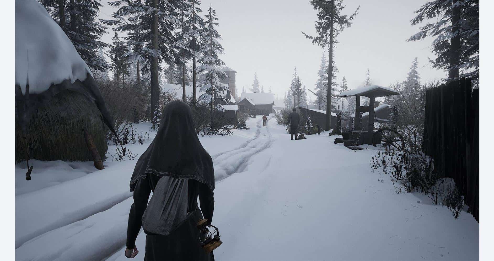A person walking through a snowy village landscape with trees and wooden structures.