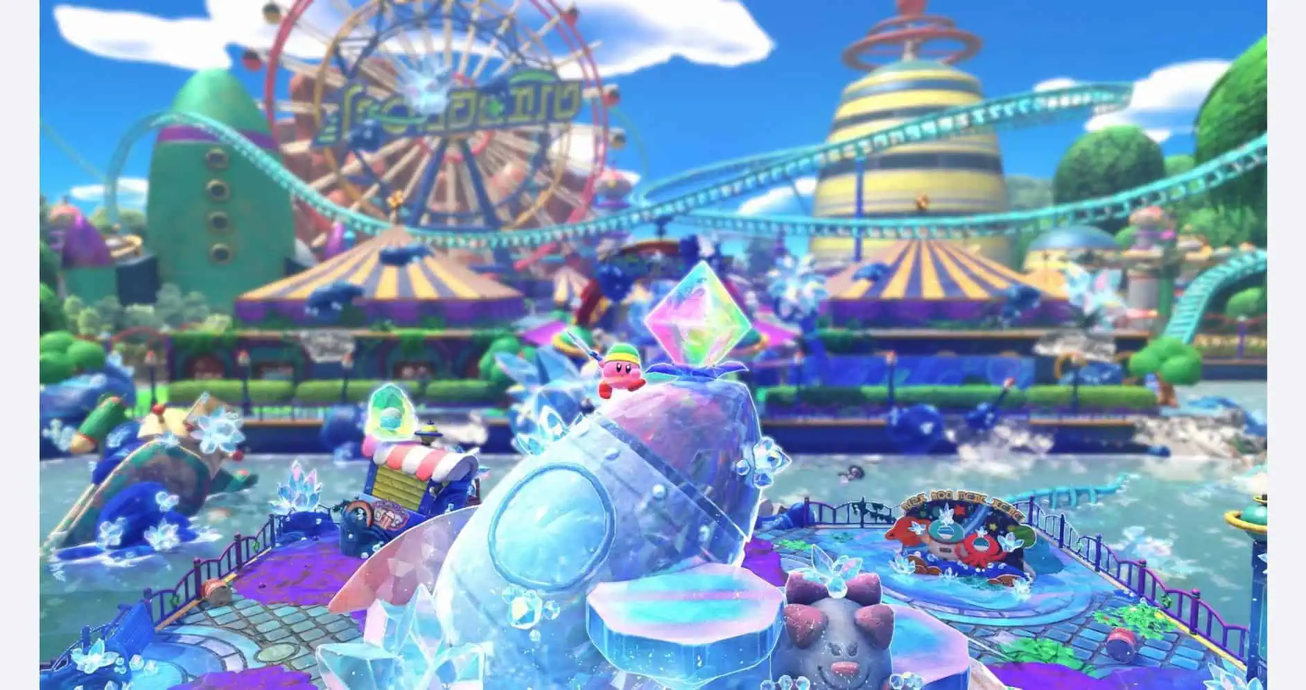 Brightly colored amusement park with Kirby in ice, rides, and water attractions.