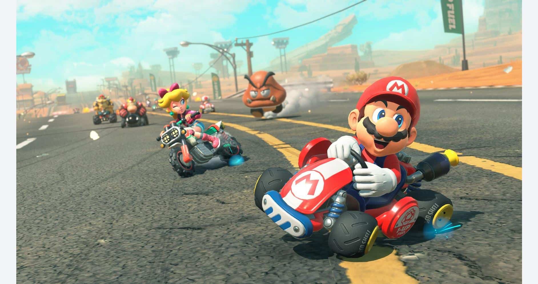 Mario driving a red go-kart in a colorful, action-packed Mario Kart race.