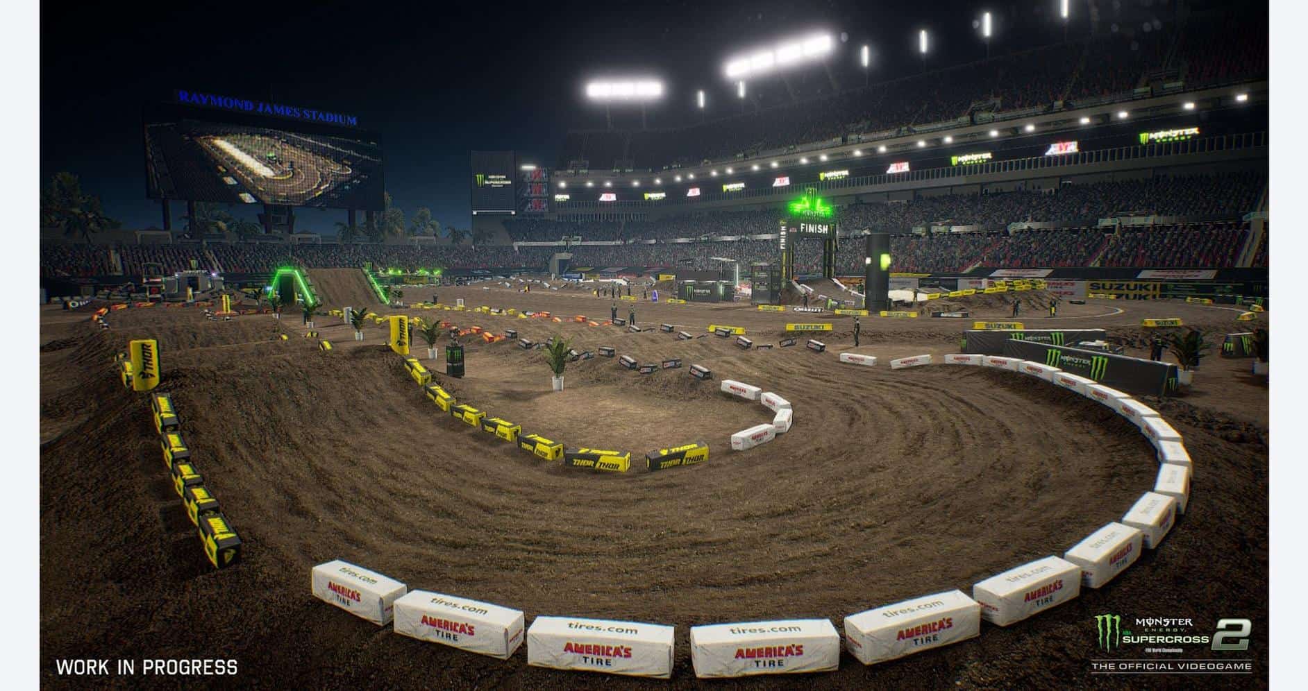 Dirt track for Monster Energy Supercross with jumps and turns in stadium setting.