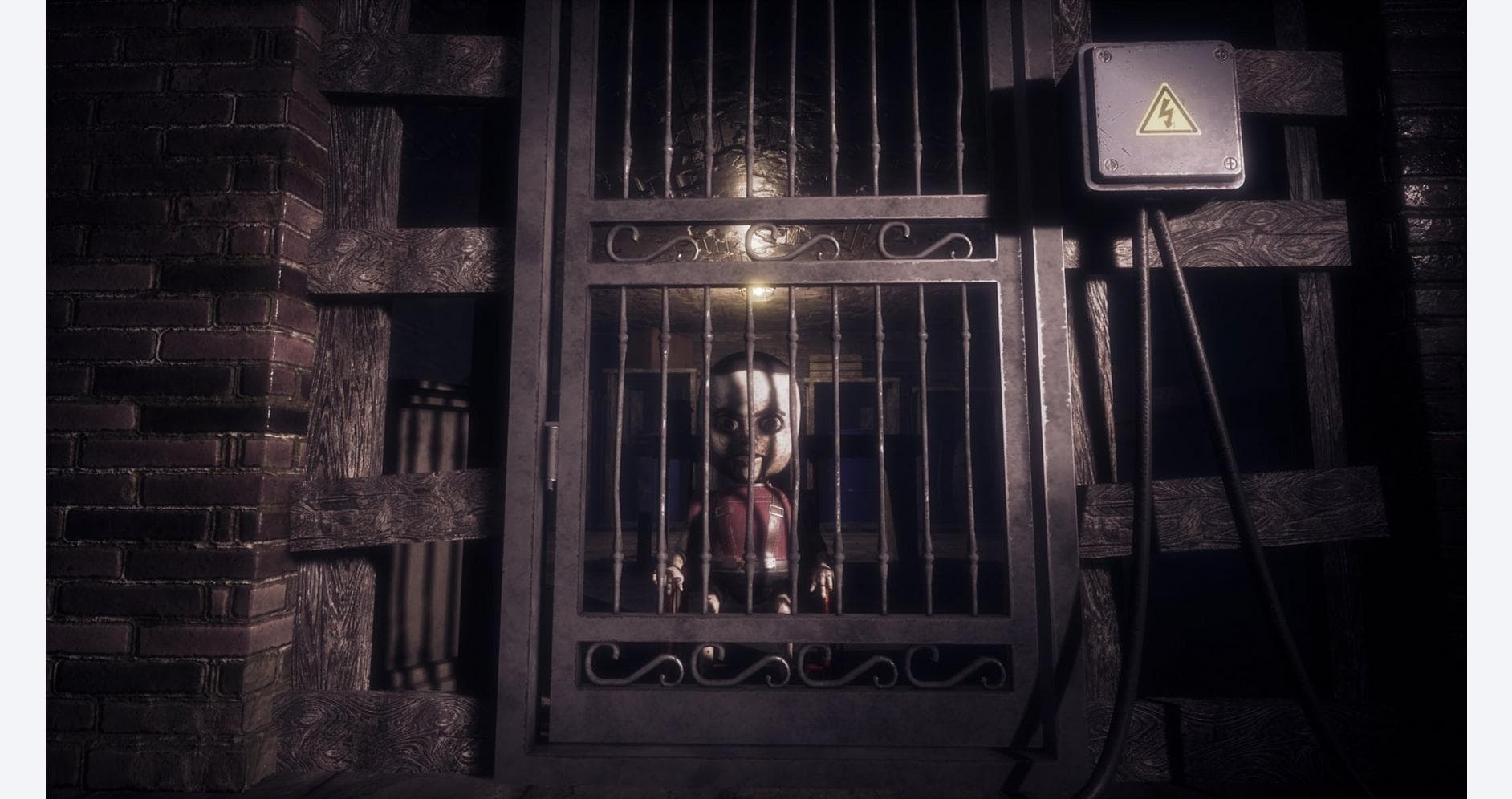 Creepy puppet doll behind a barred gate at Puppet House.