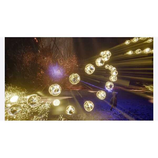 Dynamic light installation with orbs and laser effects at SAROS event.