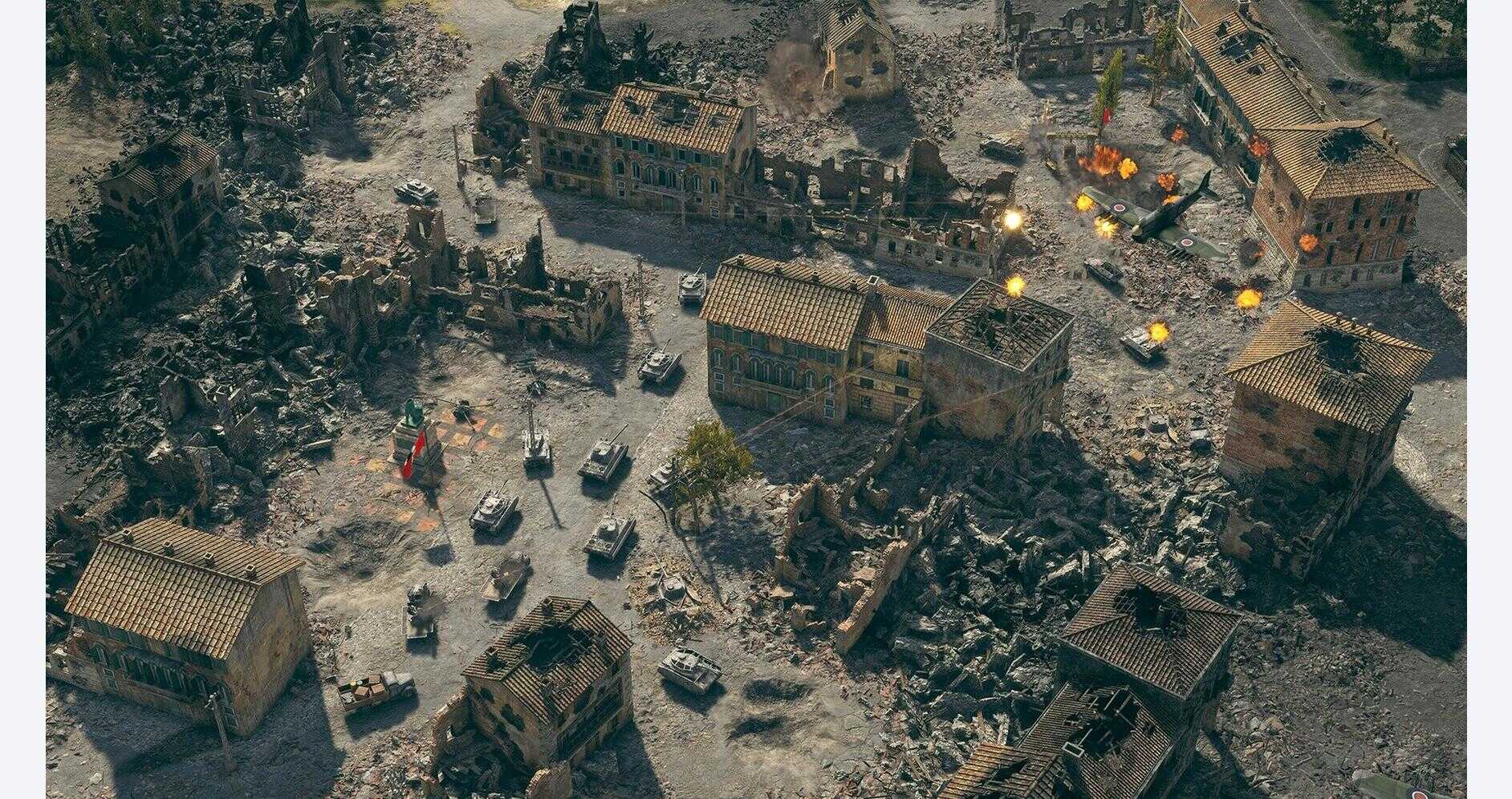 Intense battlefield scene from Sudden Strike 5 with destroyed buildings and military vehicles.