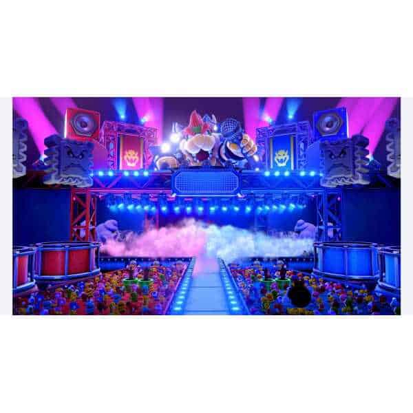 Super Mario Party stage with colorful decorations and gaming setup.