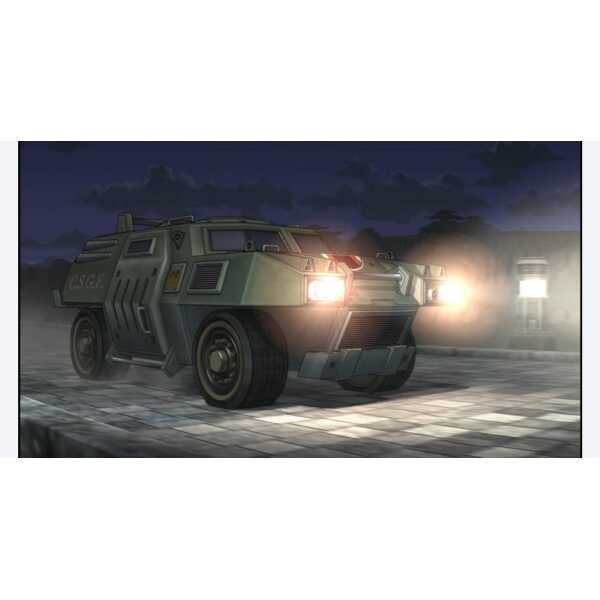 Military armored vehicle driving at night with headlights on.