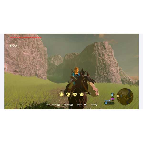 Hero riding a horse in lush green landscape with mountains in the background.