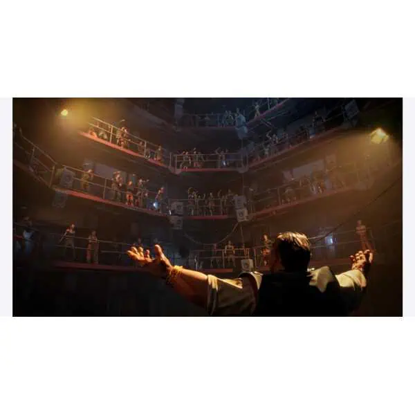 Theater director conducting a play in a multi-level theater setting.