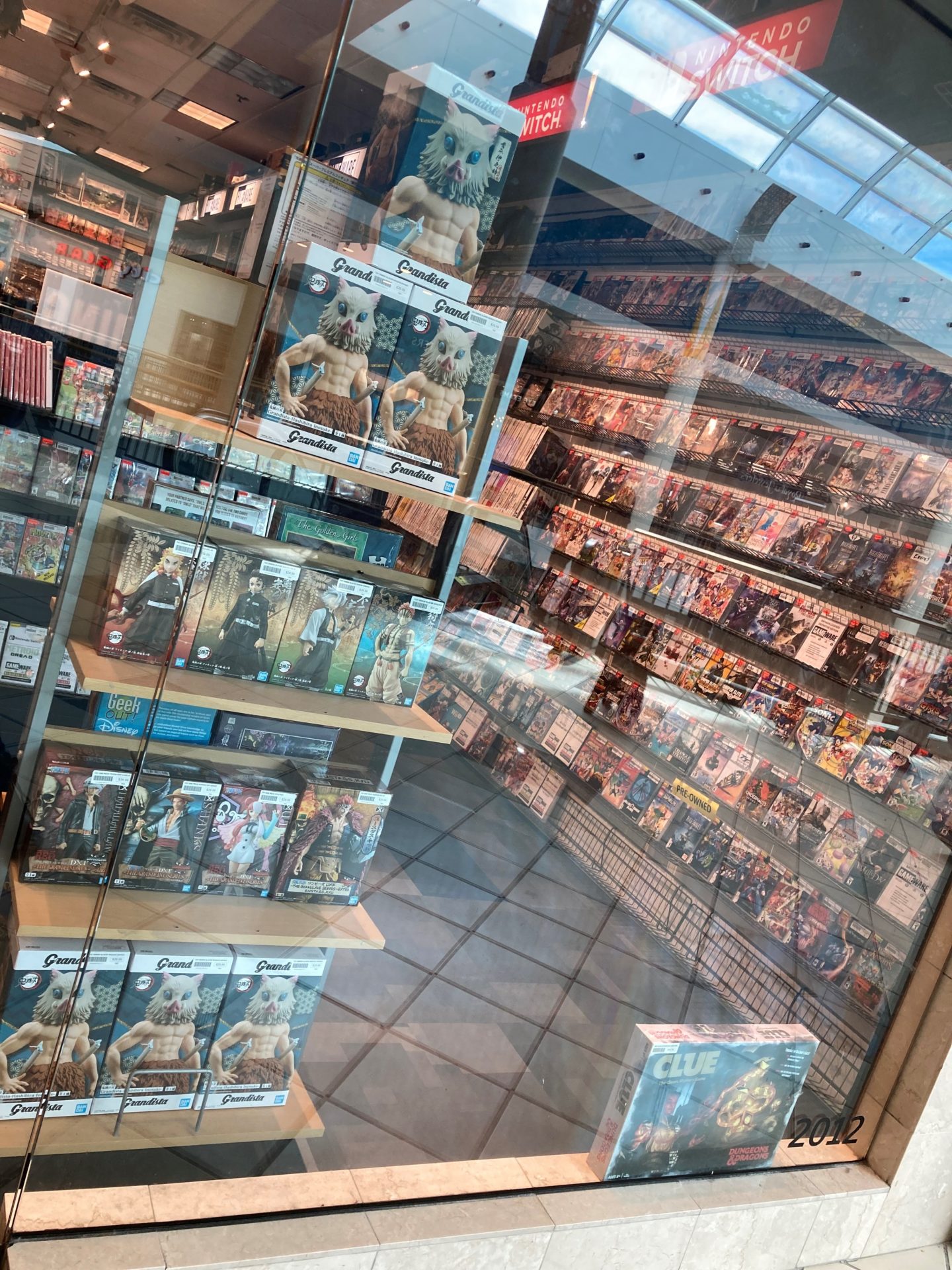 a view of GameWare from outside, looking in on the Nintendo Switch selection